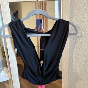 Elegant Black Sleeveless Top Edikted